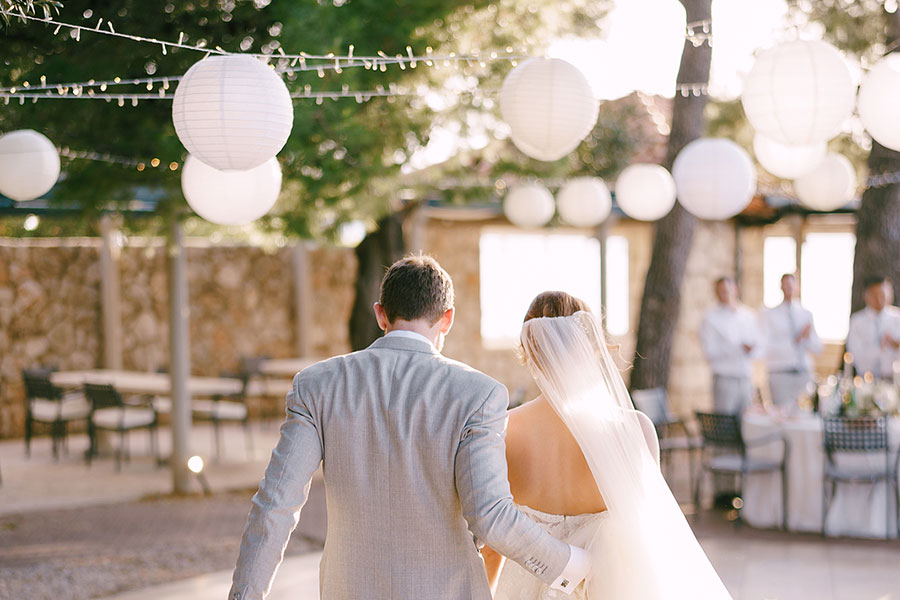 wedding-decor-paper-lanterns Bride and Groom walking under Paper Lanterns