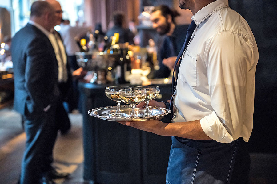 Caterer Passing Drinks at Corporate Event