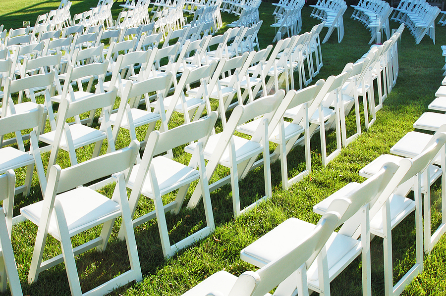 Chair White Padded Rental Chairs set up for a Wedding